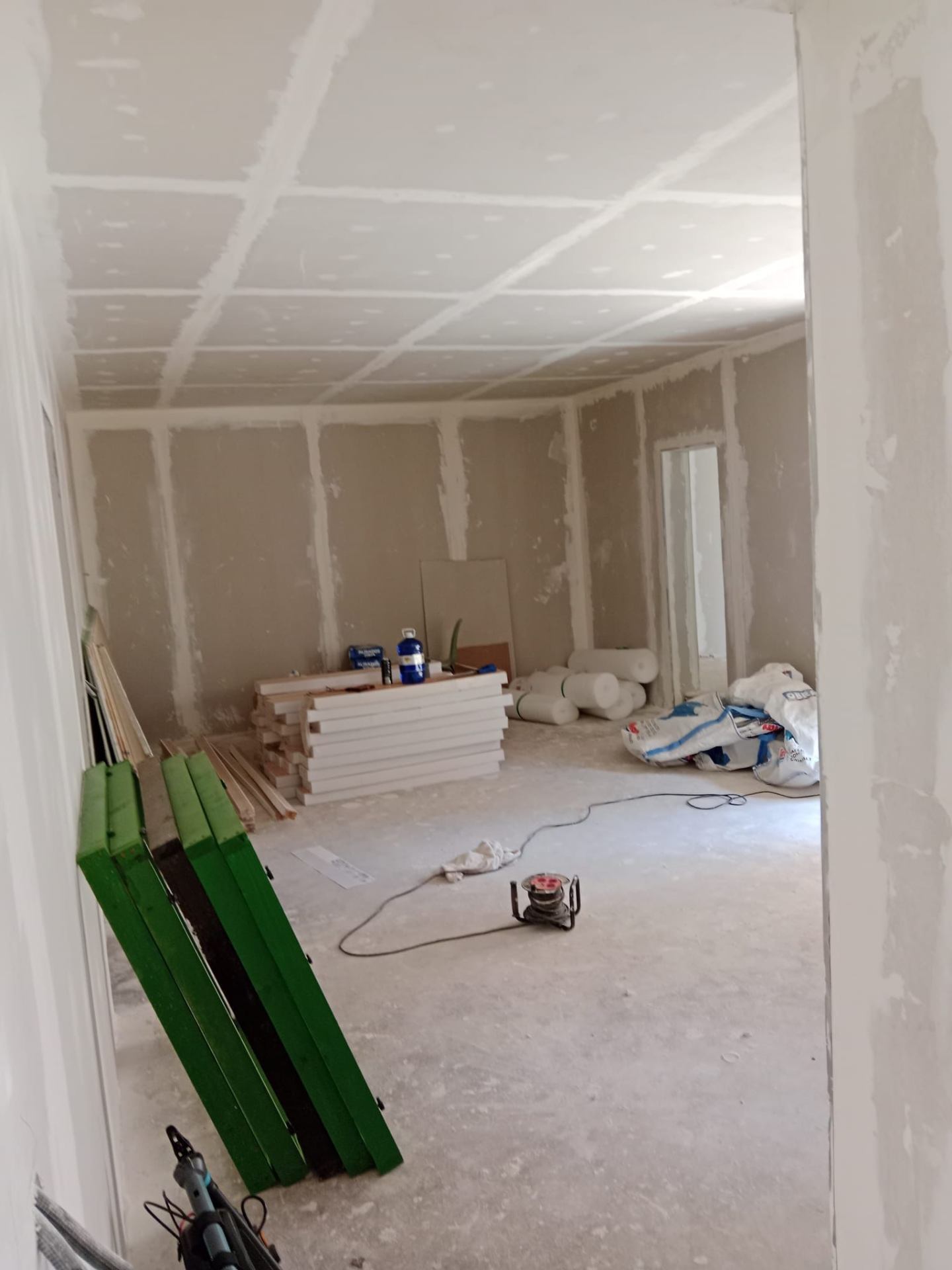 Plasterboarded, taped and jointed dry-lined room ready for skim by SJM Plastering, Fareham